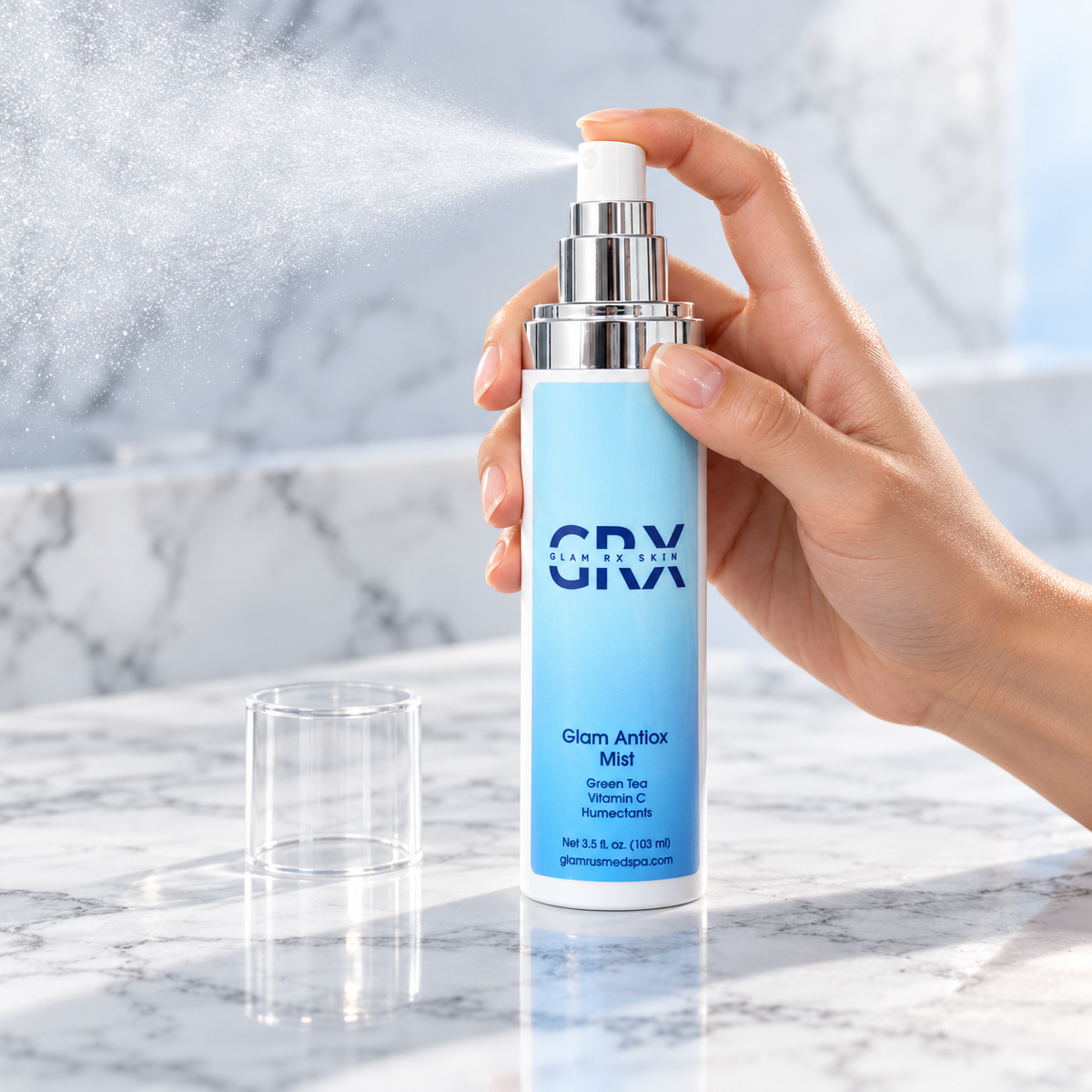 Glam Antioxidant Mist spraying a fine facial mist